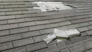 local roofer roof repairs blown off asphalt shingles